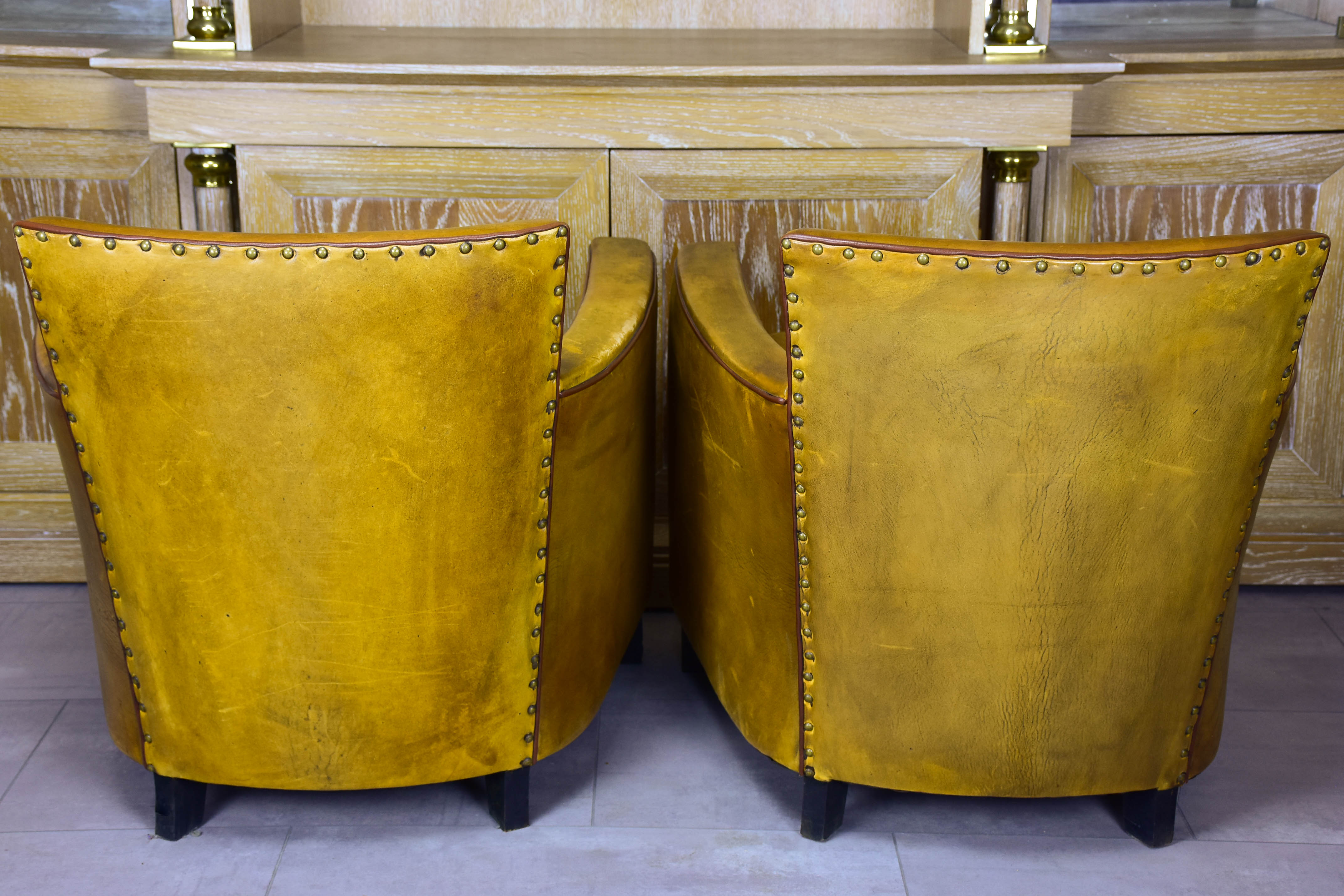 Pair of vintage French leather club chairs