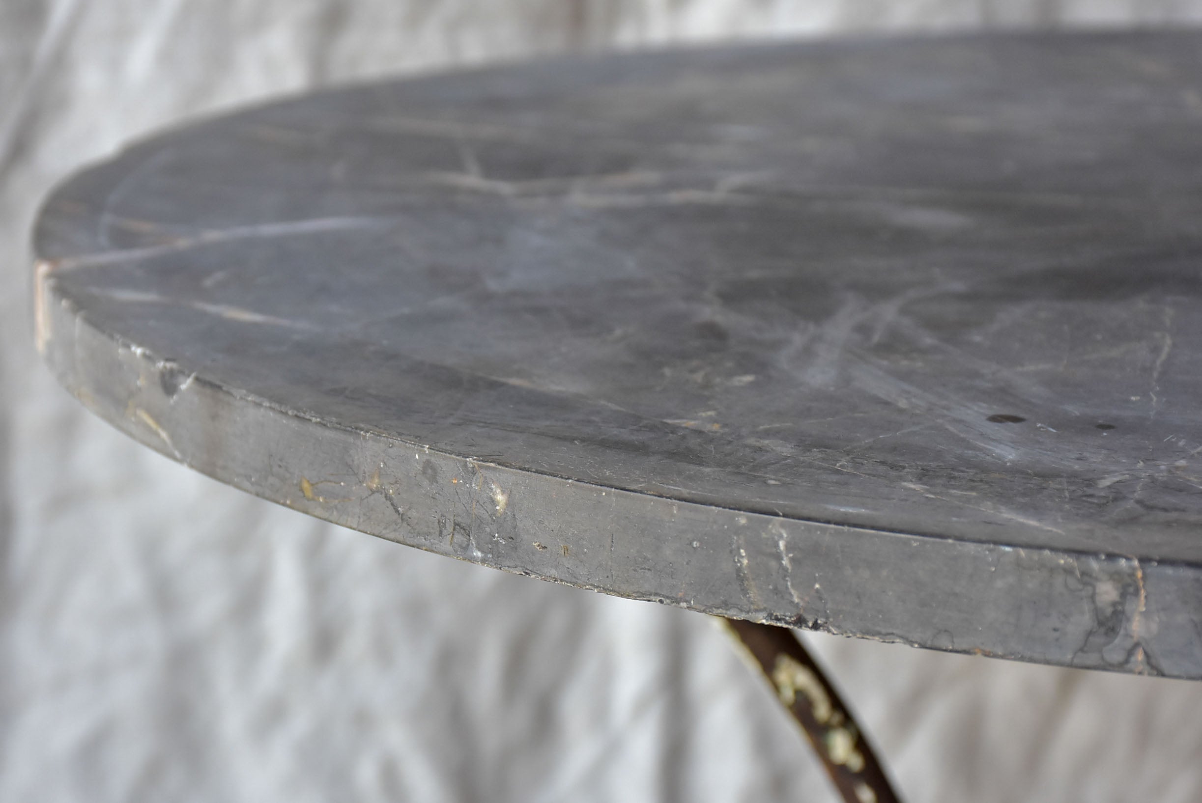 Antique French round garden table with black marble top