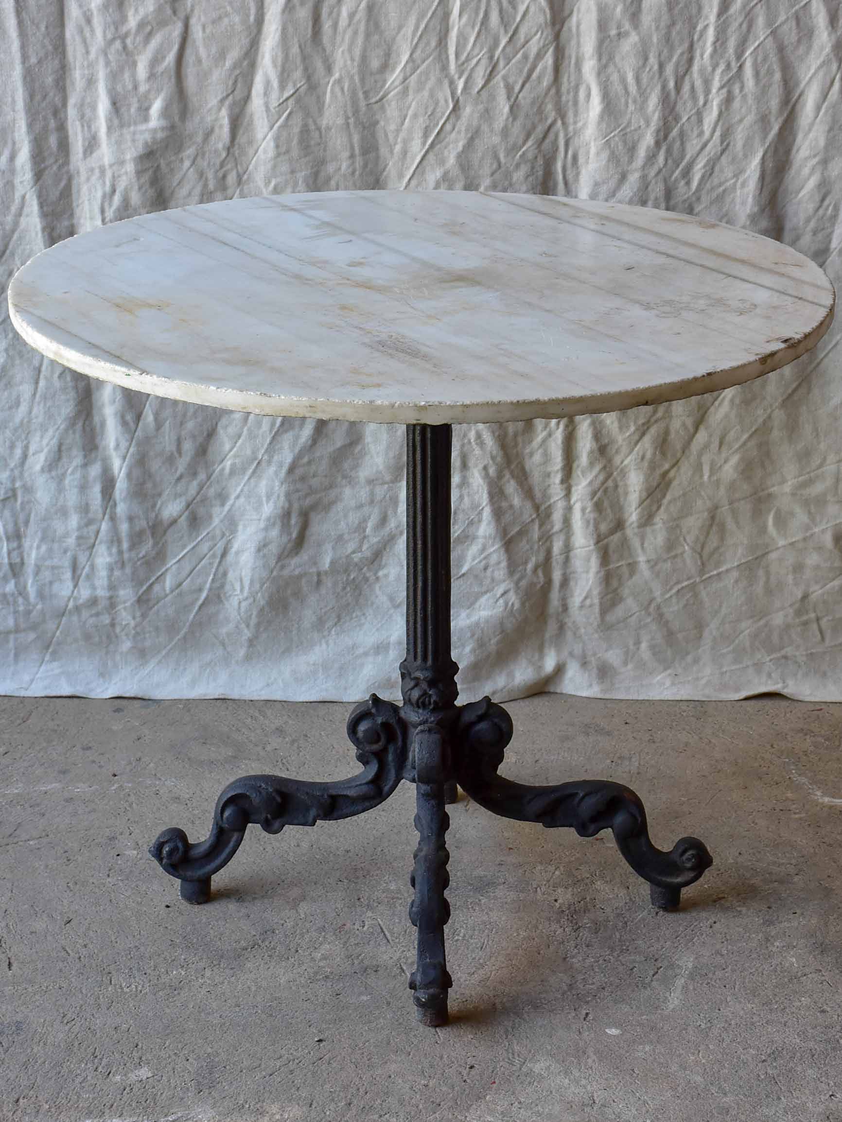 Round French garden table - black base, marble top