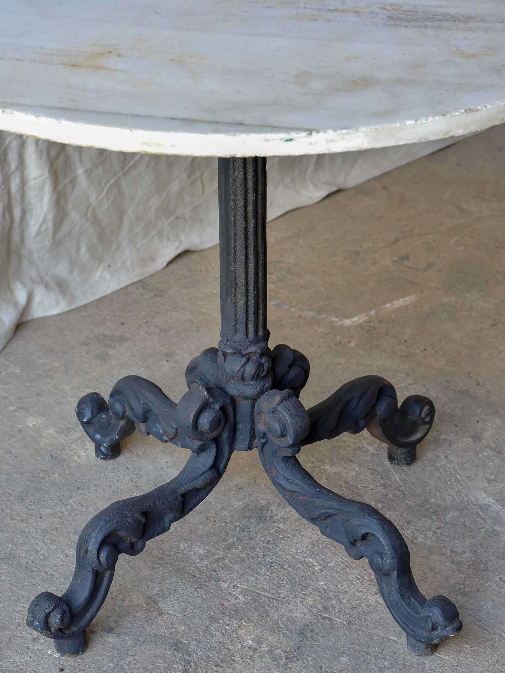 Round French garden table - black base, marble top