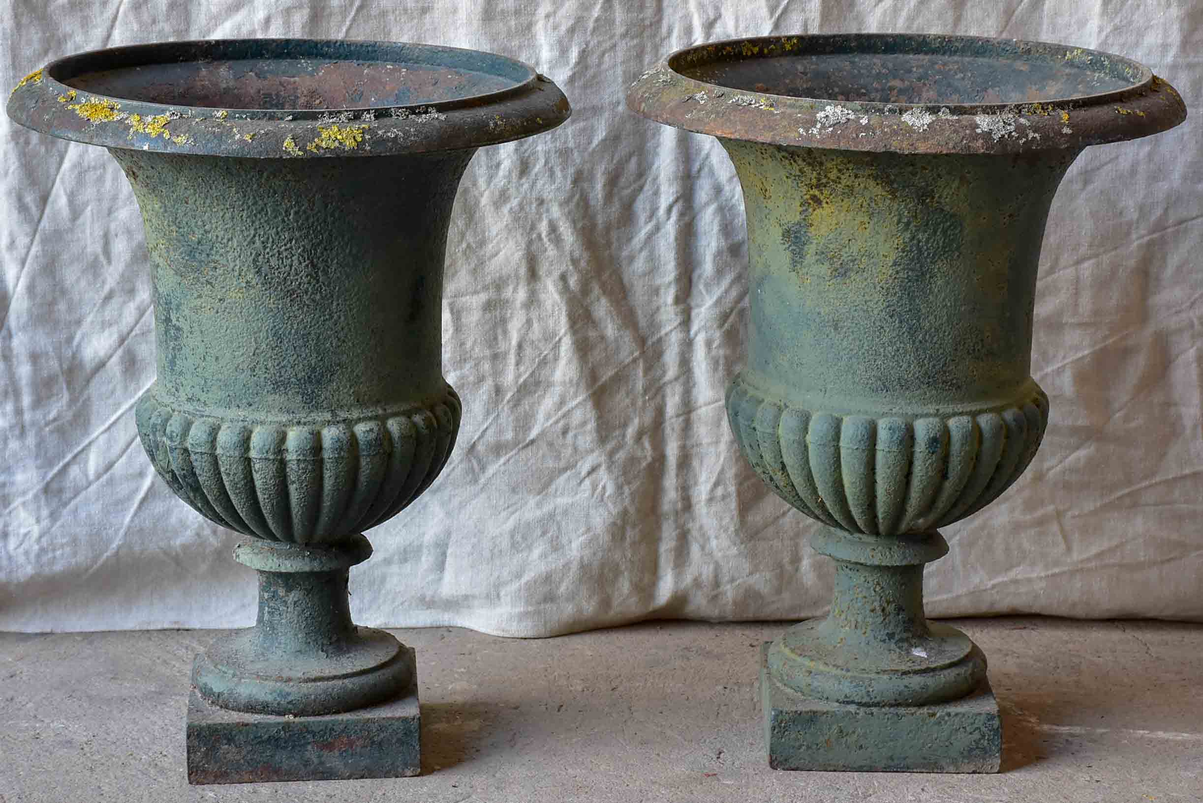 Pair of large antique French Medici garden urns with green patina