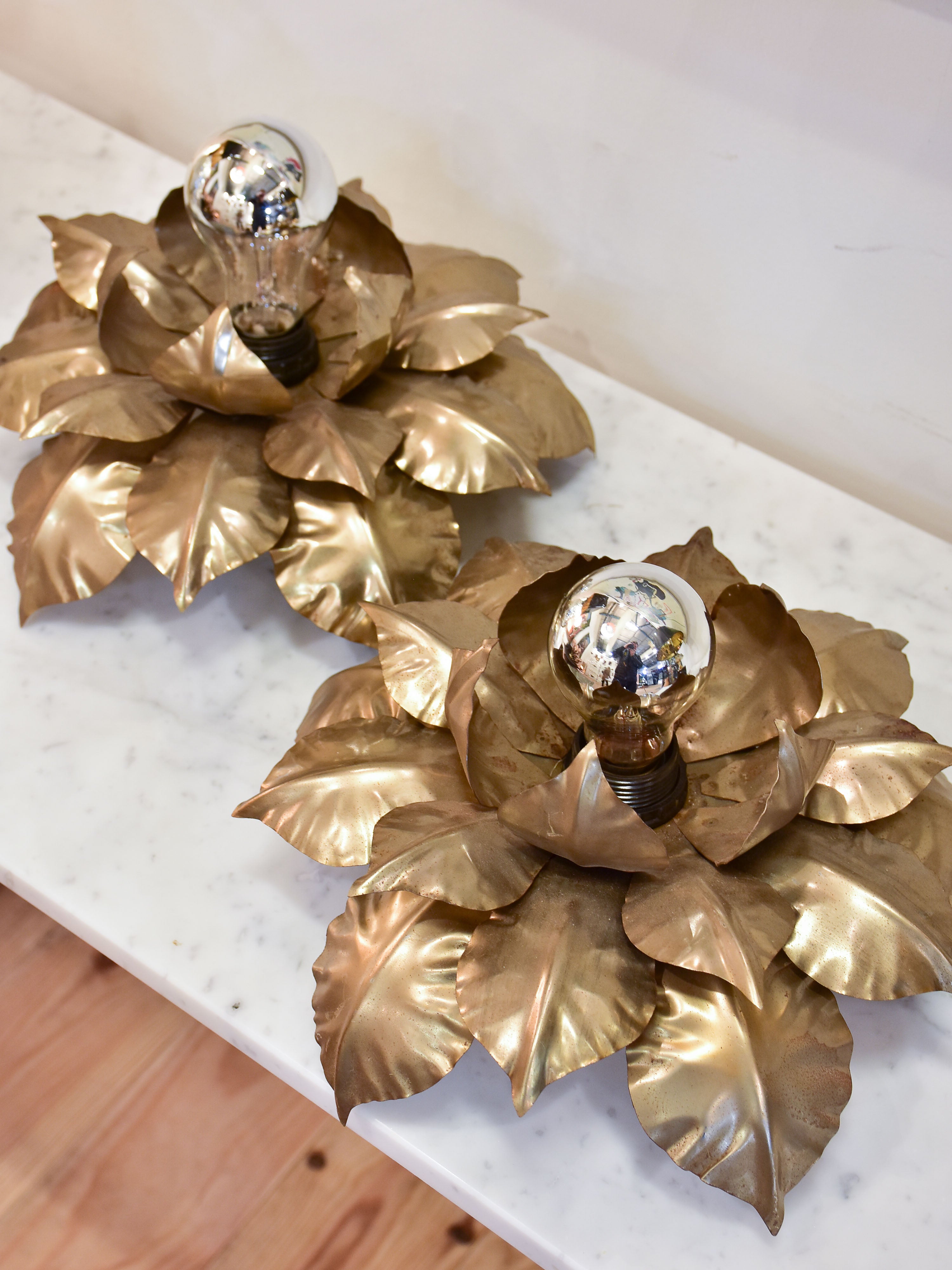 Pair of vintage wall / ceiling sconces with sculptural gold leaves