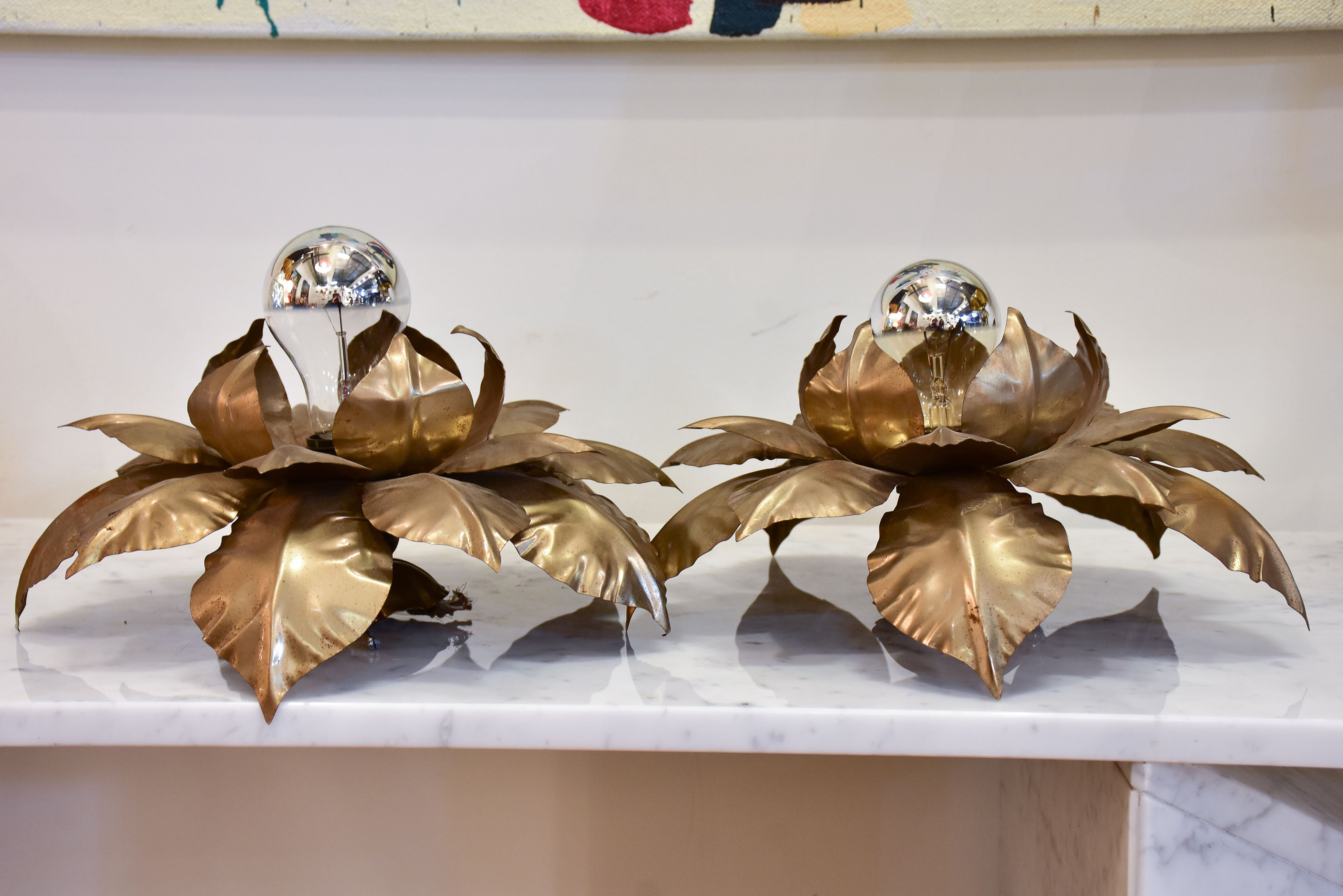 Pair of vintage wall / ceiling sconces with sculptural gold leaves