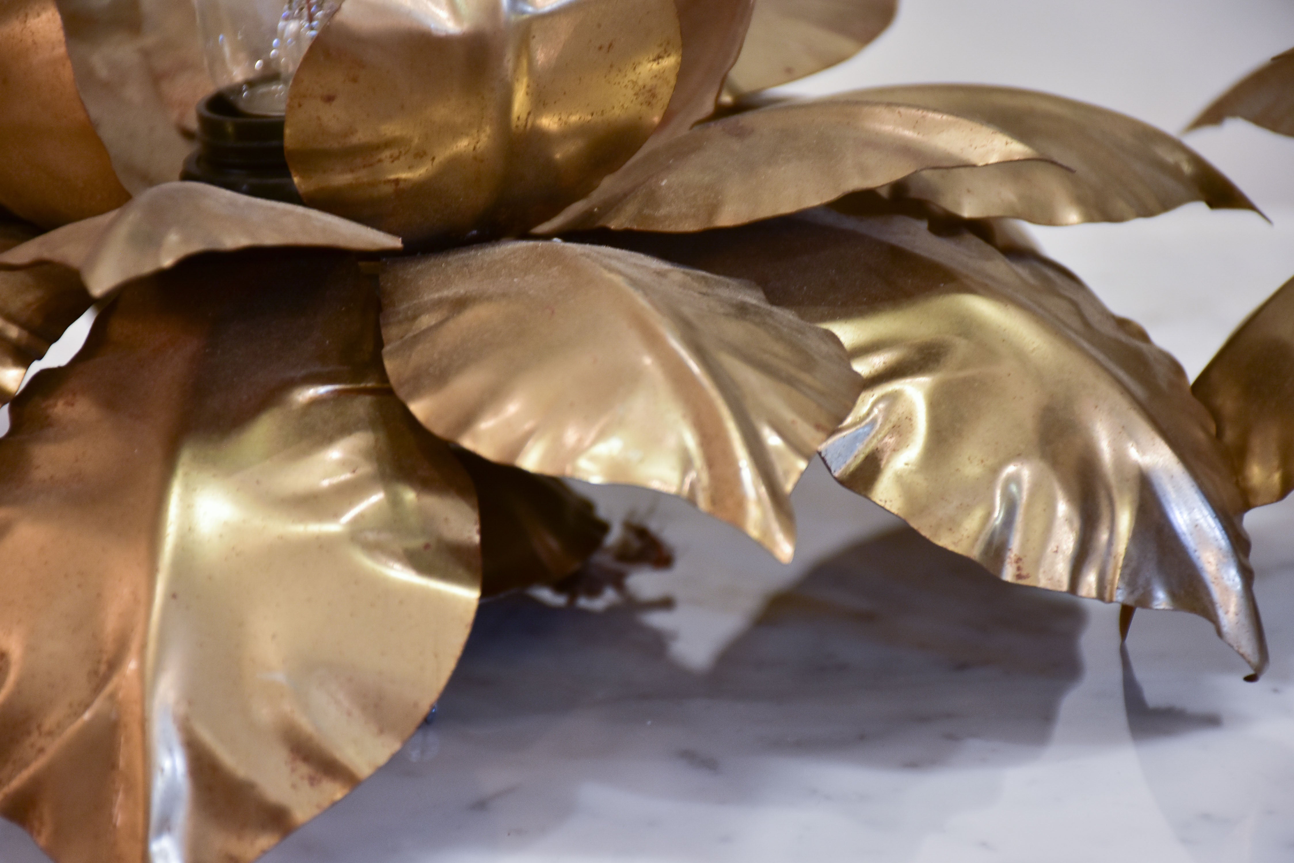 Pair of vintage wall / ceiling sconces with sculptural gold leaves