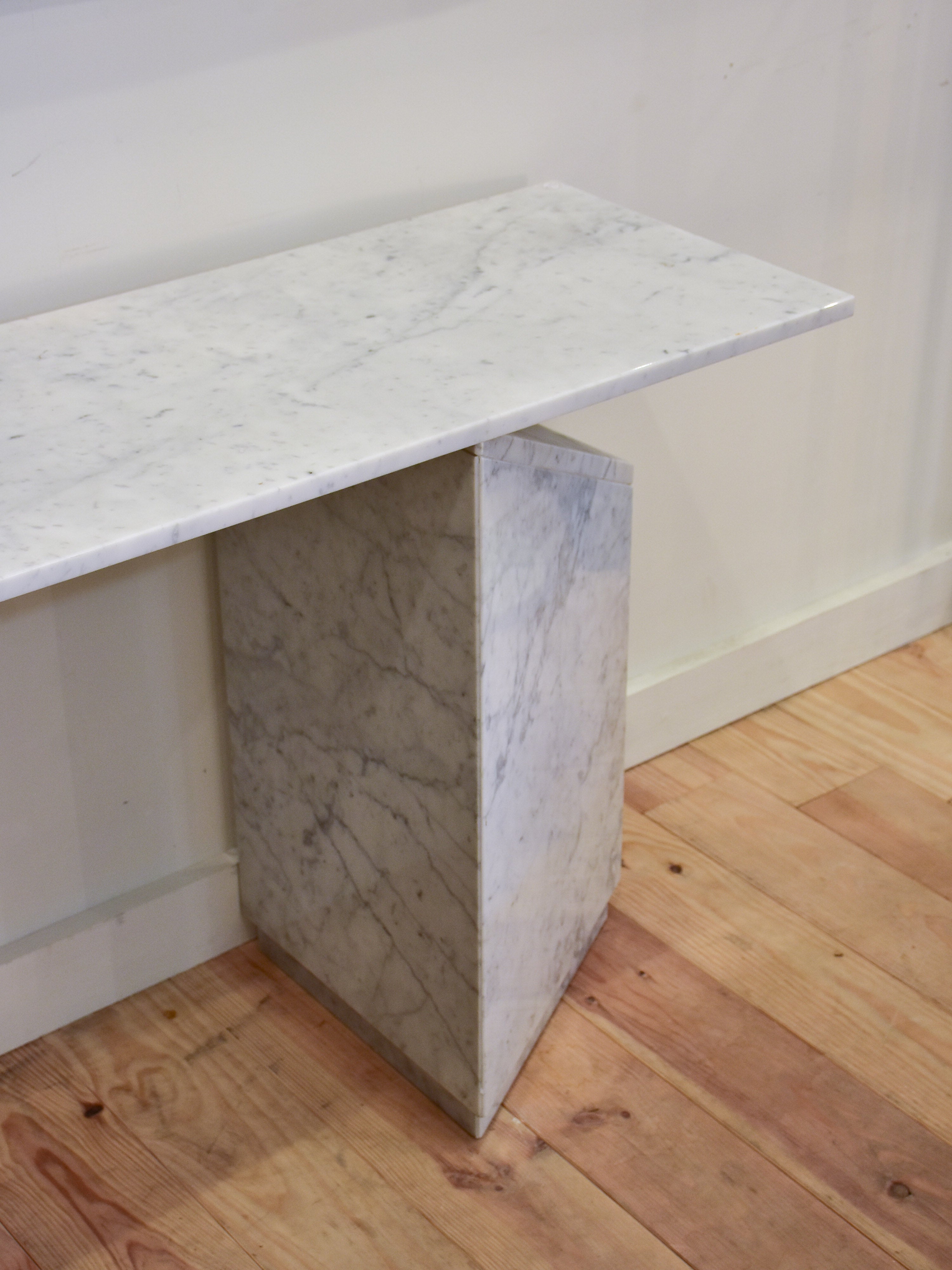 Vintage white marble console table with triangular legs