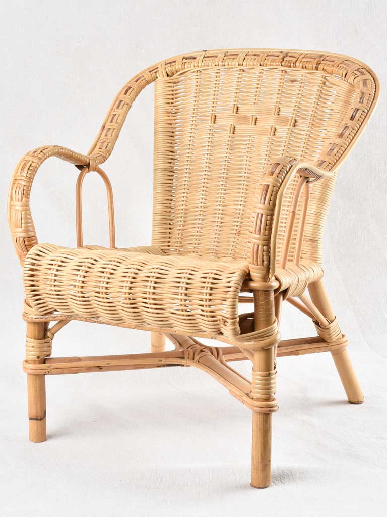 Vintage child's wicker armchair