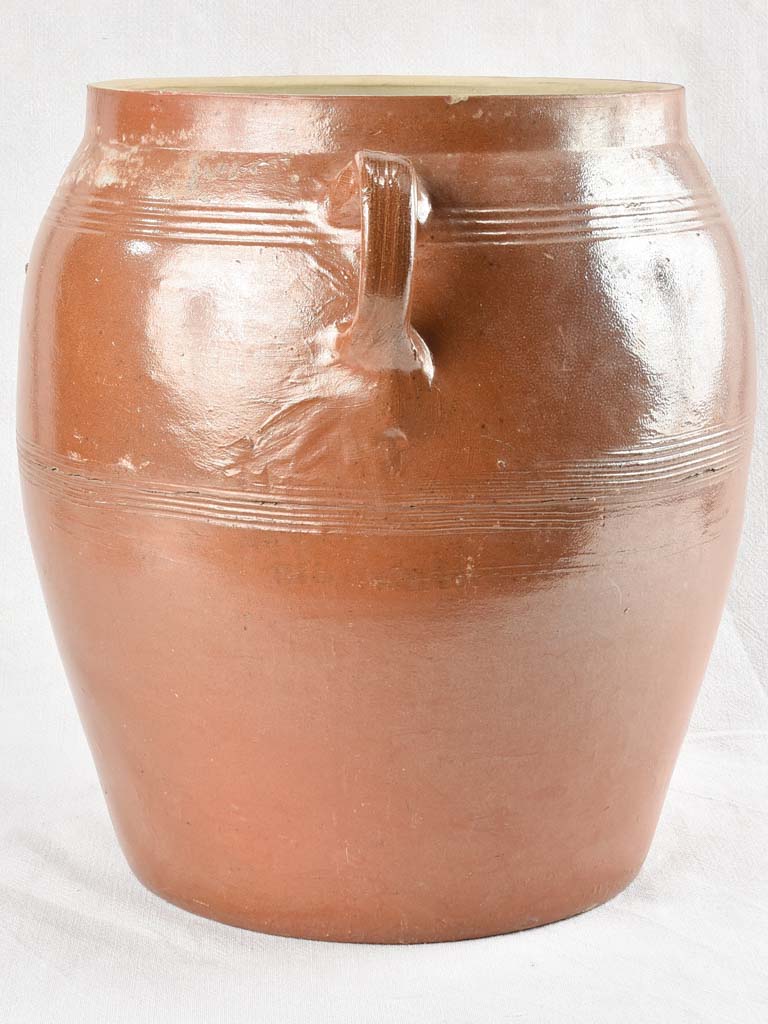 Very large antique crock pot with brown glaze