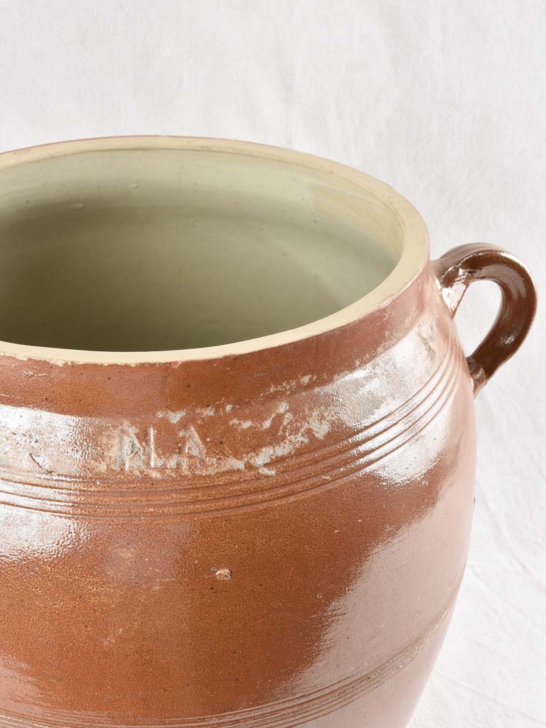 Very large antique crock pot with brown glaze