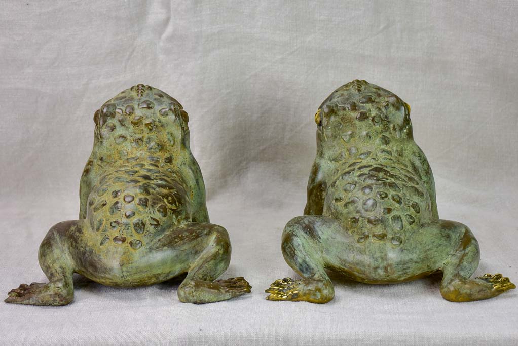 Pair of metal garden frog sculptures