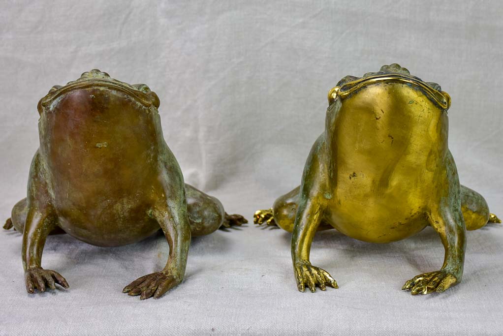 Pair of metal garden frog sculptures