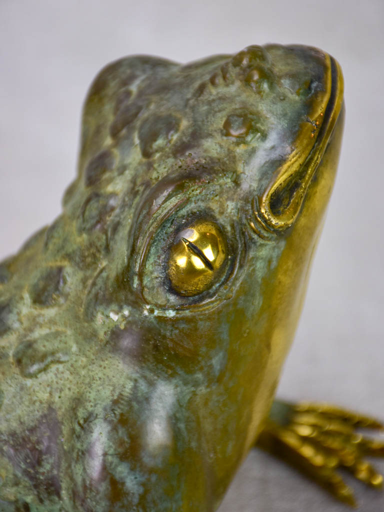 Pair of metal garden frog sculptures