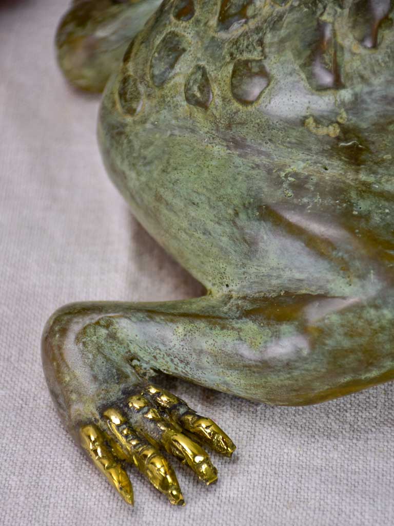 Pair of metal garden frog sculptures