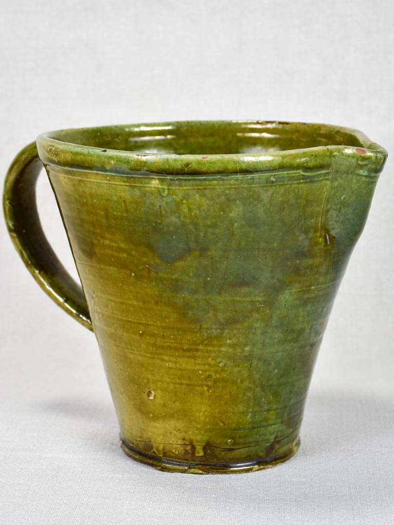 1930's ceramic pitcher with green glaze 8"