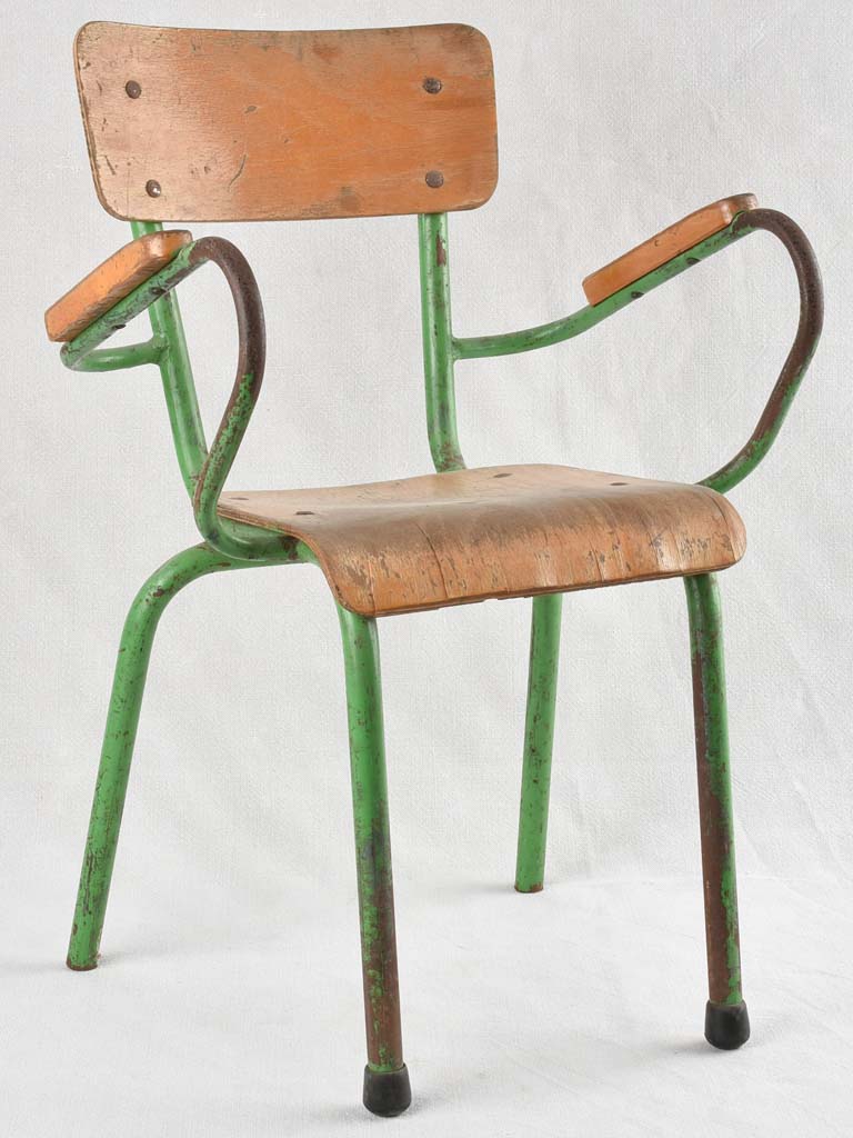 Vintage children's armchair with green patina