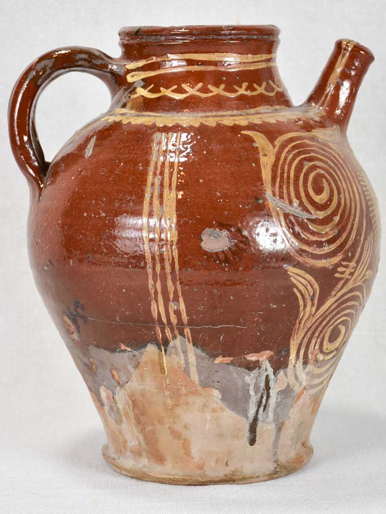 Late 19th century French water pitcher with brown glaze and beige decoration 12¼"