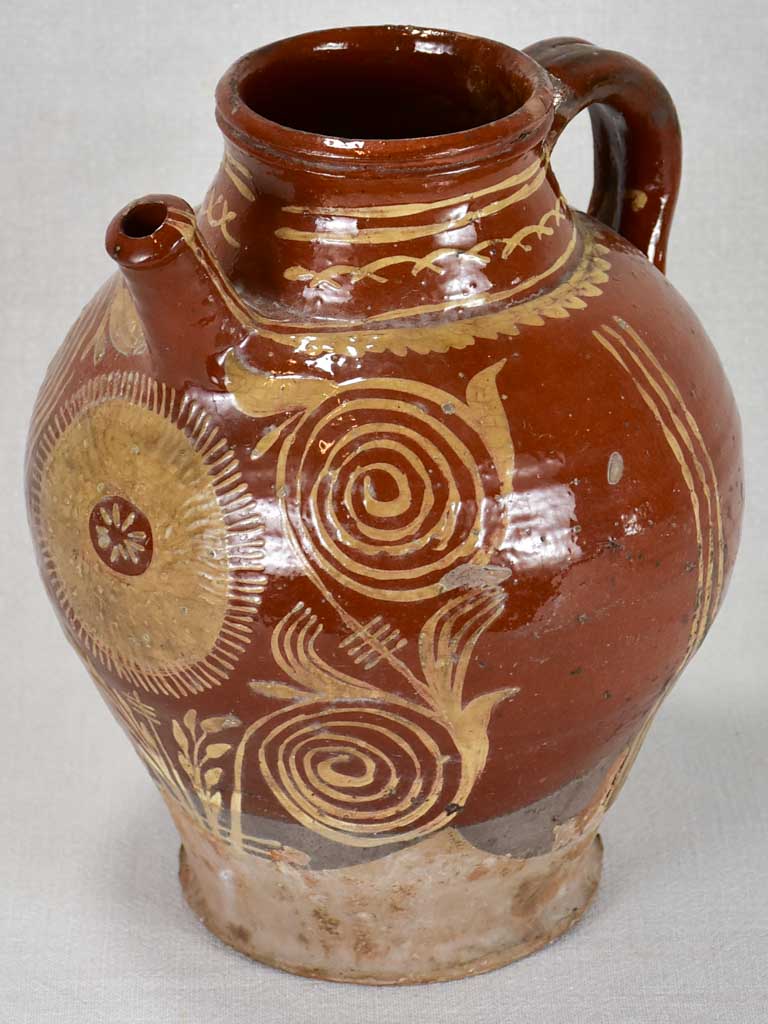 Late 19th century French water pitcher with brown glaze and beige decoration 12¼"