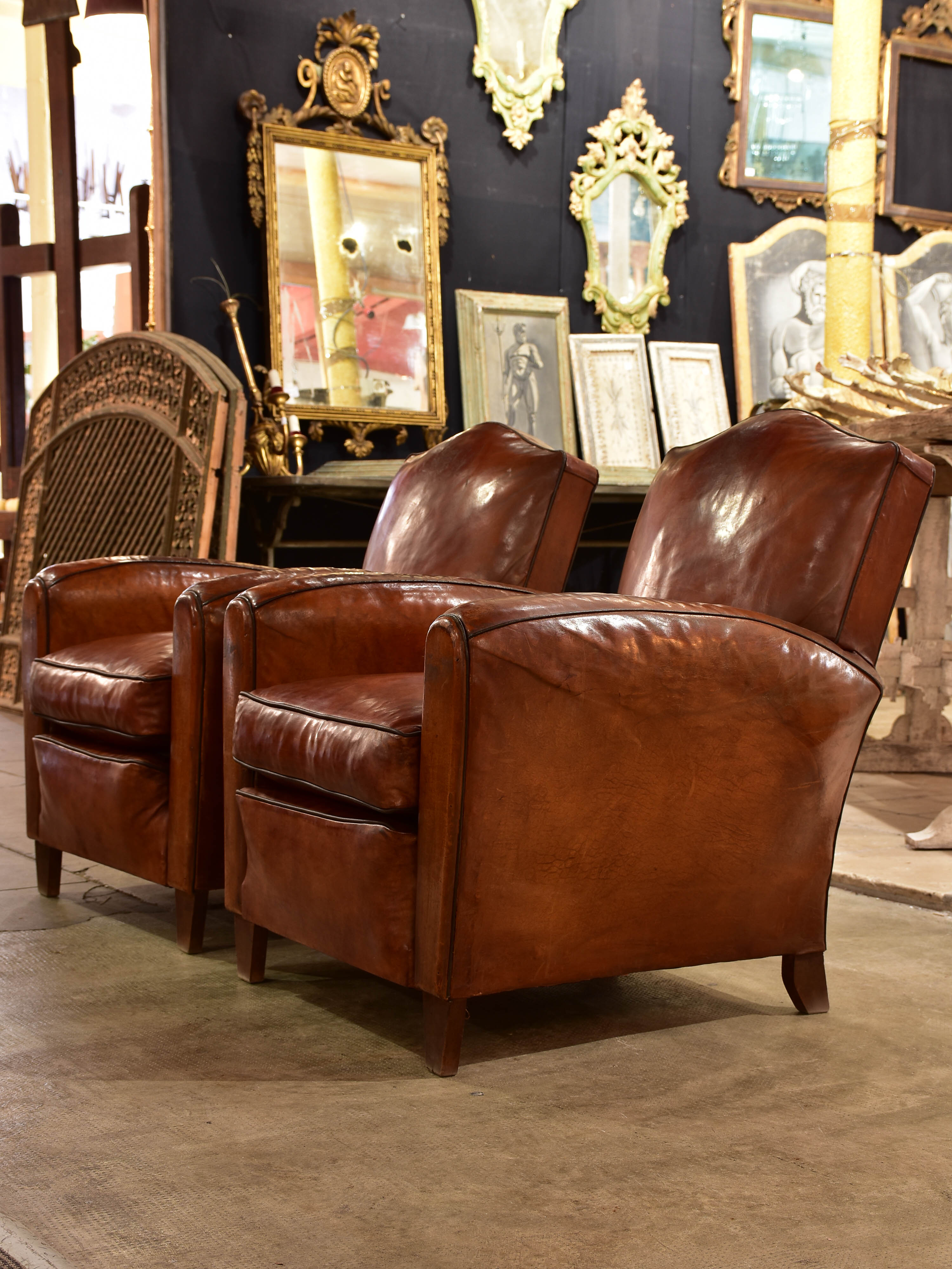 Pair of vintage French leather club chairs with - chapeau gendarme