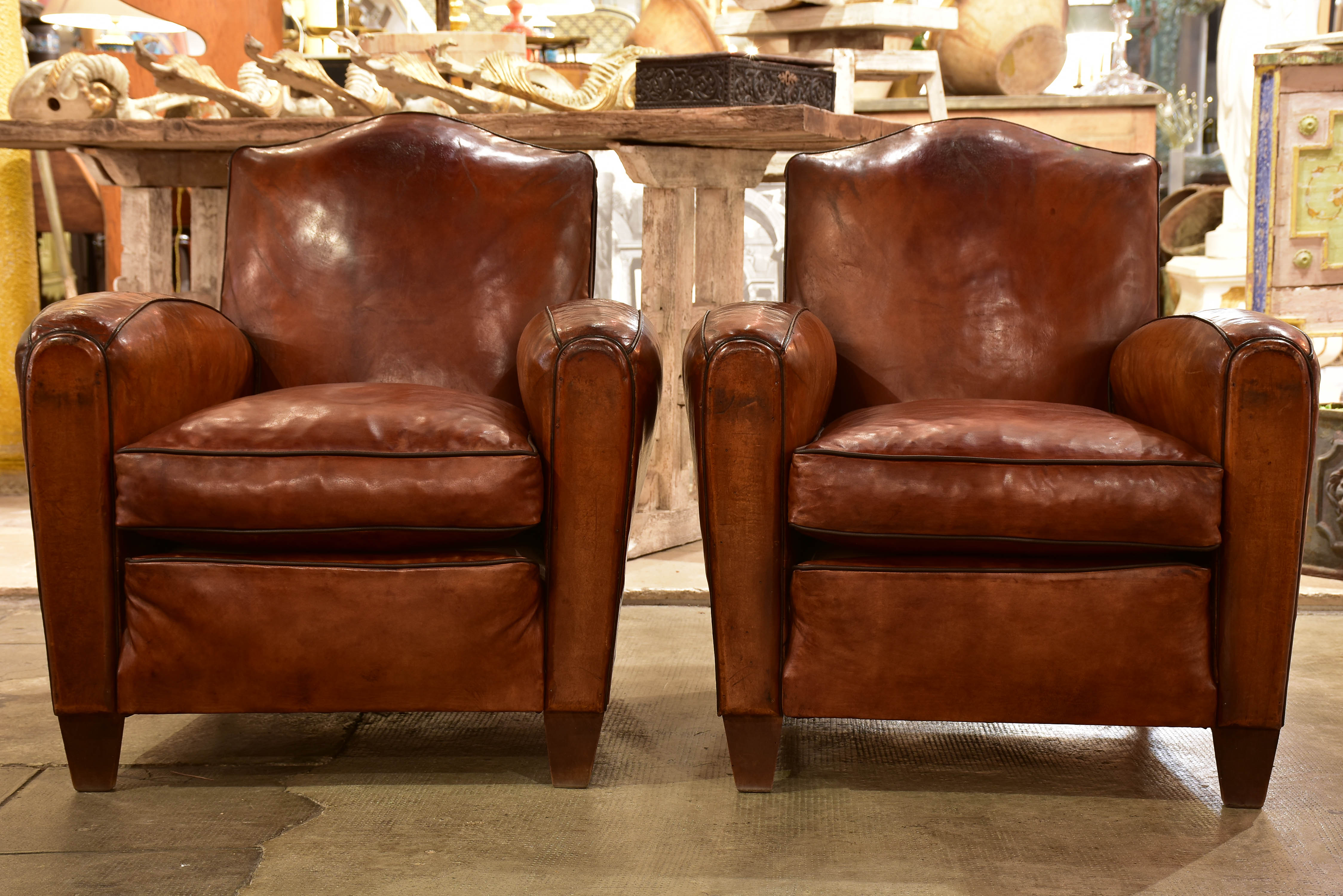 Pair of vintage French leather club chairs with - chapeau gendarme