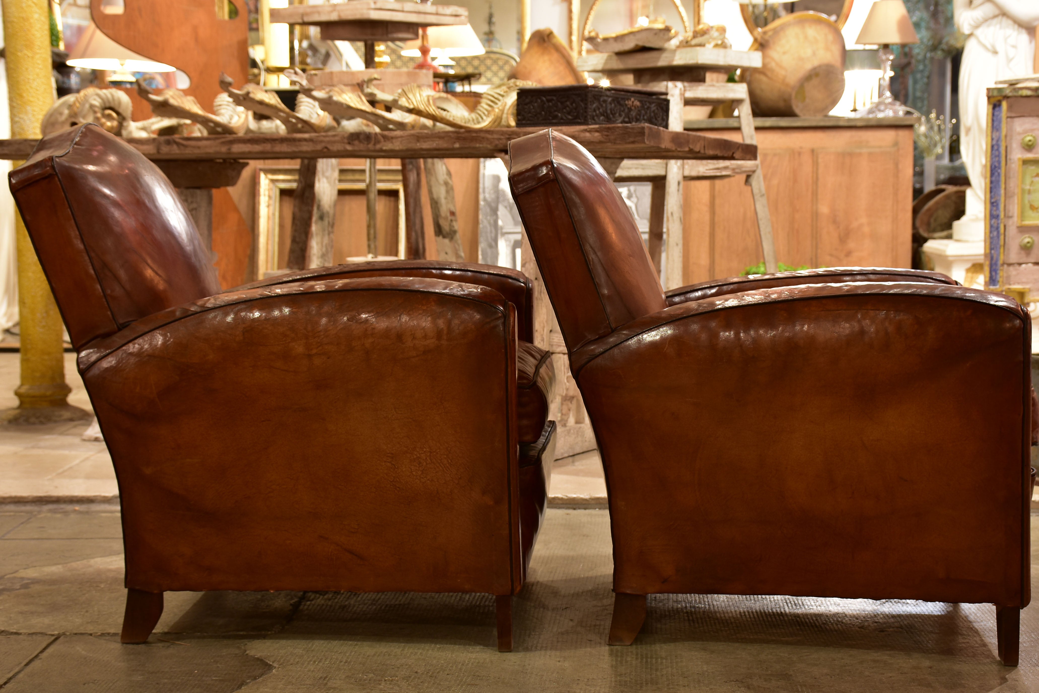 Pair of vintage French leather club chairs with - chapeau gendarme