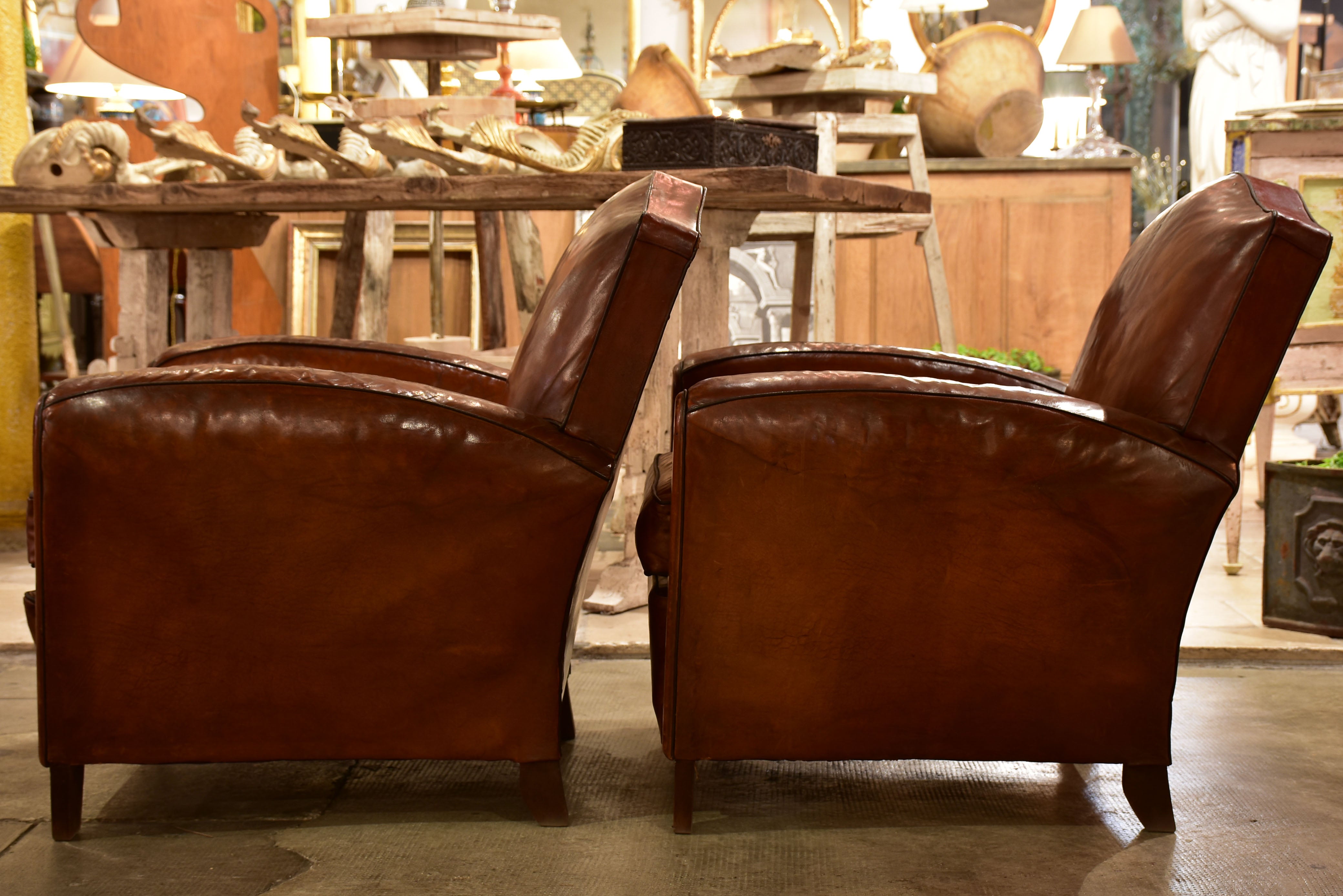 Pair of vintage French leather club chairs with - chapeau gendarme