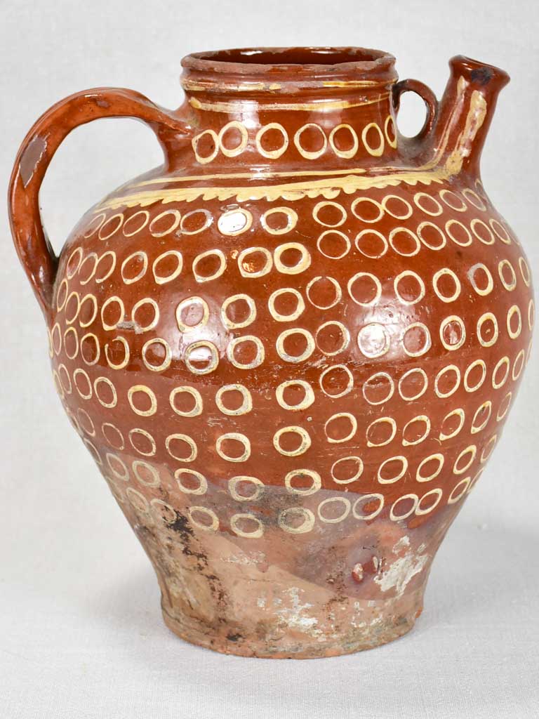 Late 19th century French water pitcher with brown glaze and beige spots