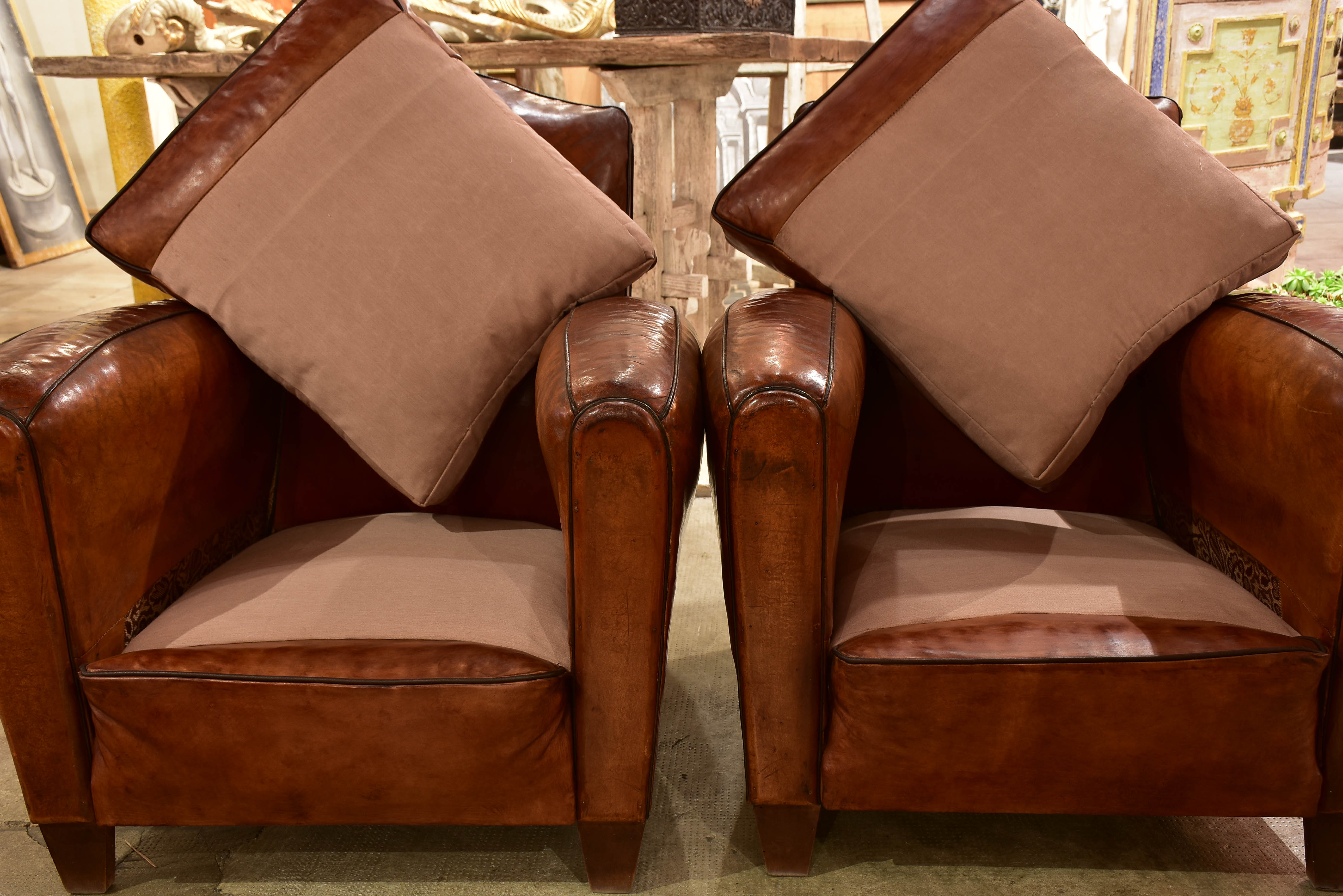 Pair of vintage French leather club chairs with - chapeau gendarme