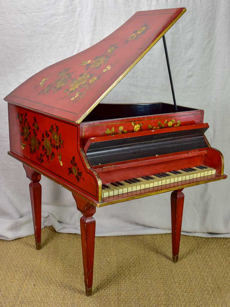 Antique small scale grand piano