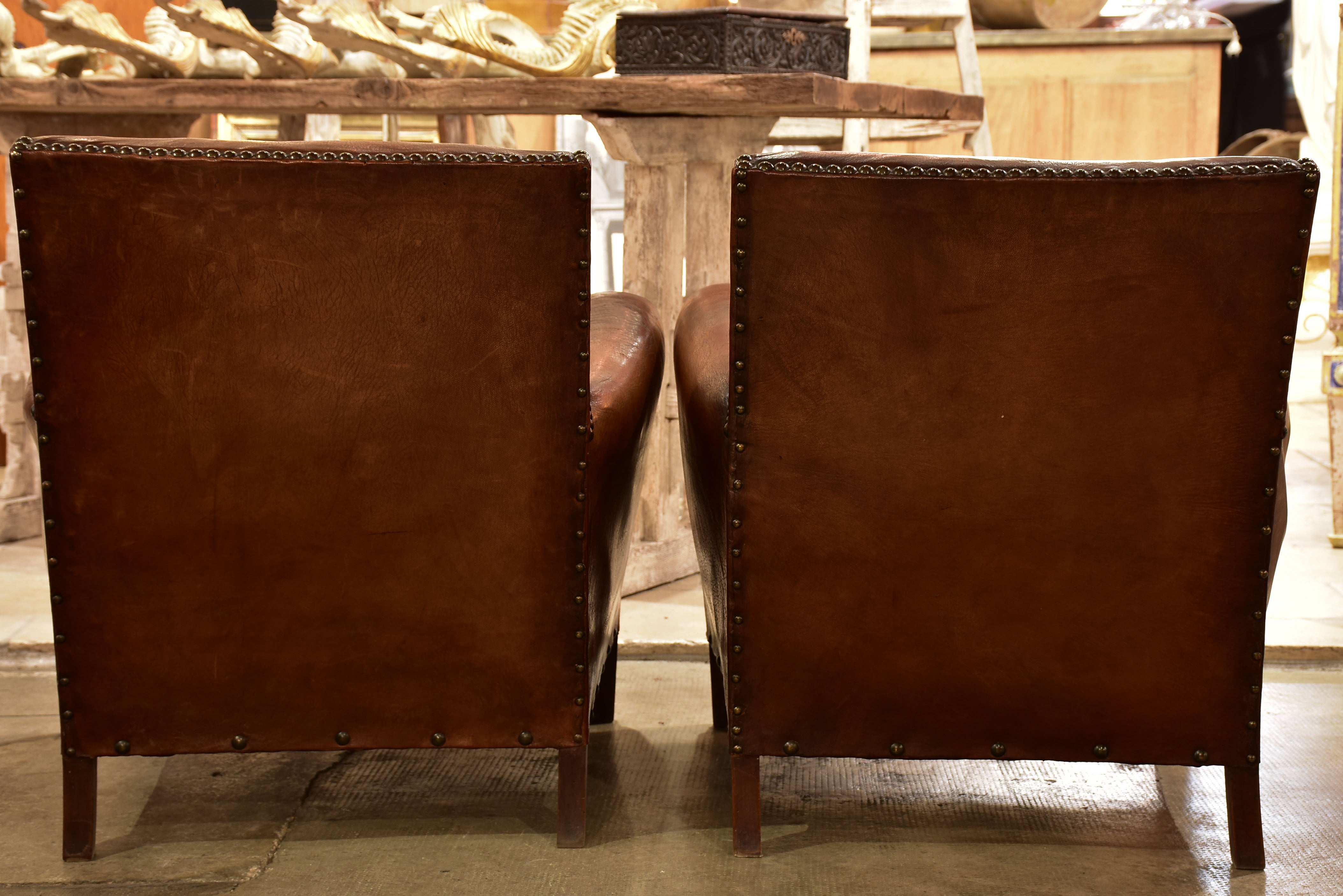 Pair of French leather club chairs from the 1930's with stud detail