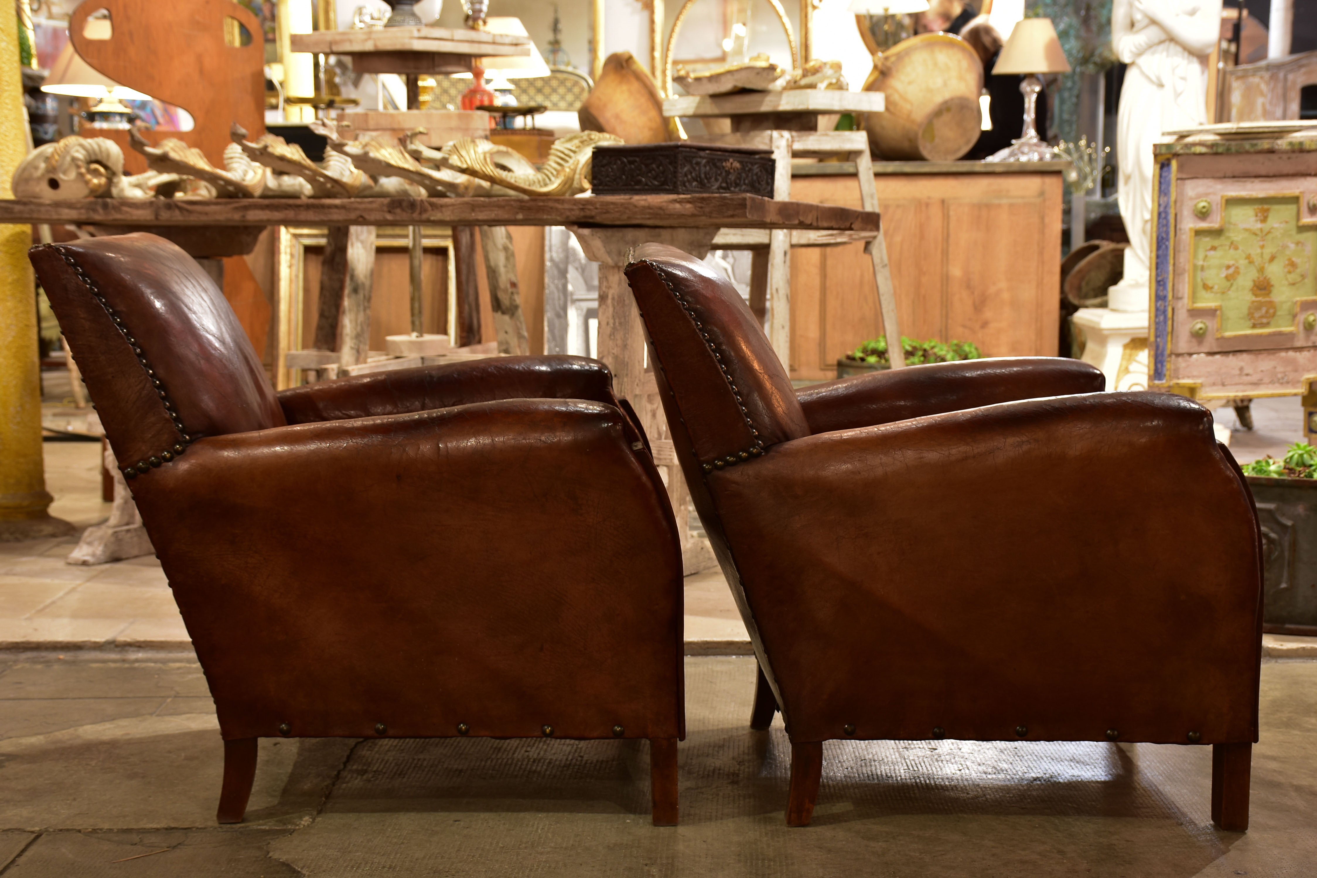 Pair of French leather club chairs from the 1930's with stud detail