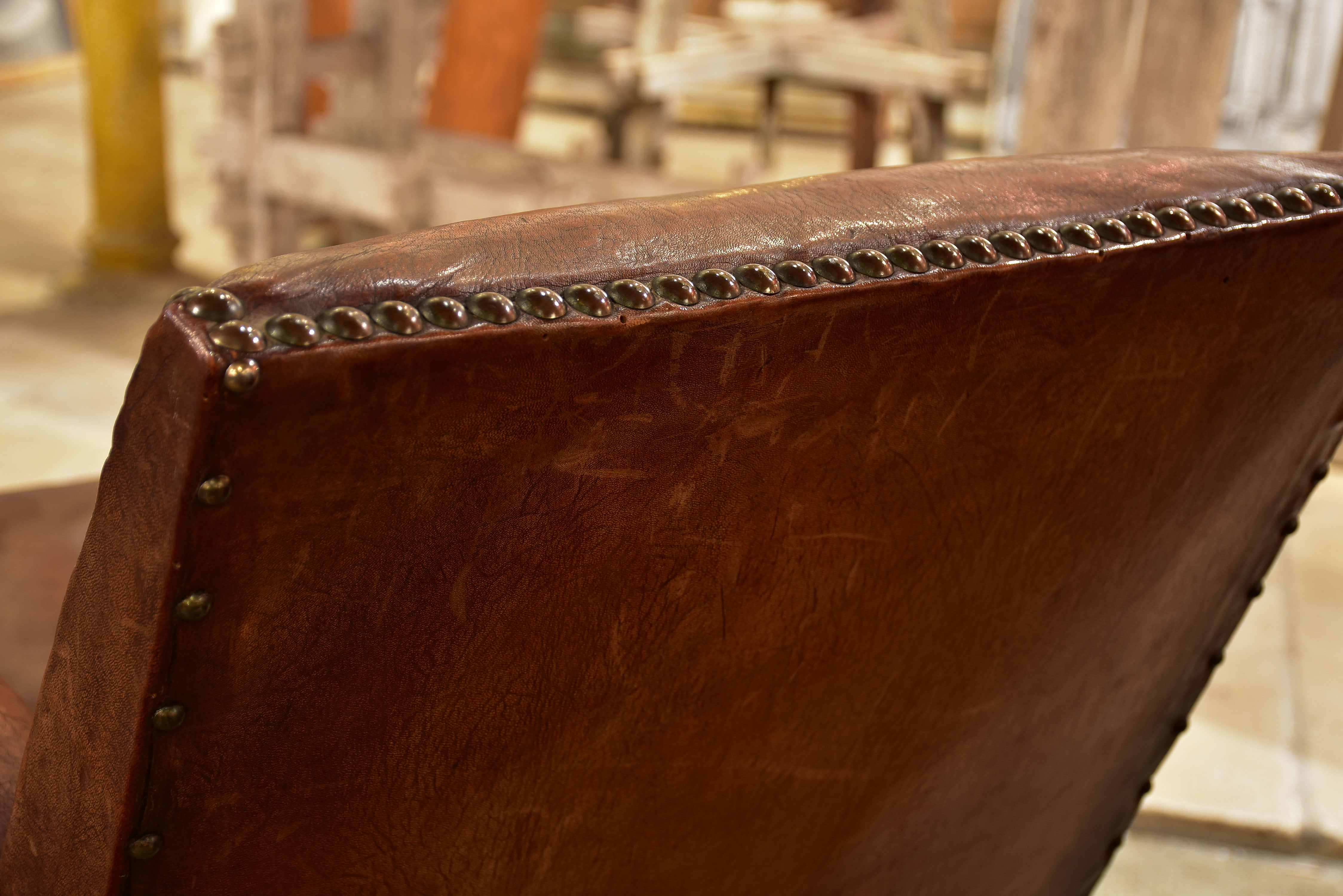 Pair of French leather club chairs from the 1930's with stud detail