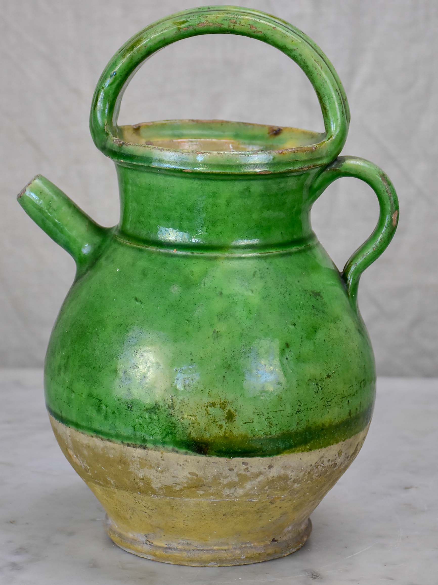 Small 19th Century French water pitcher with green glaze