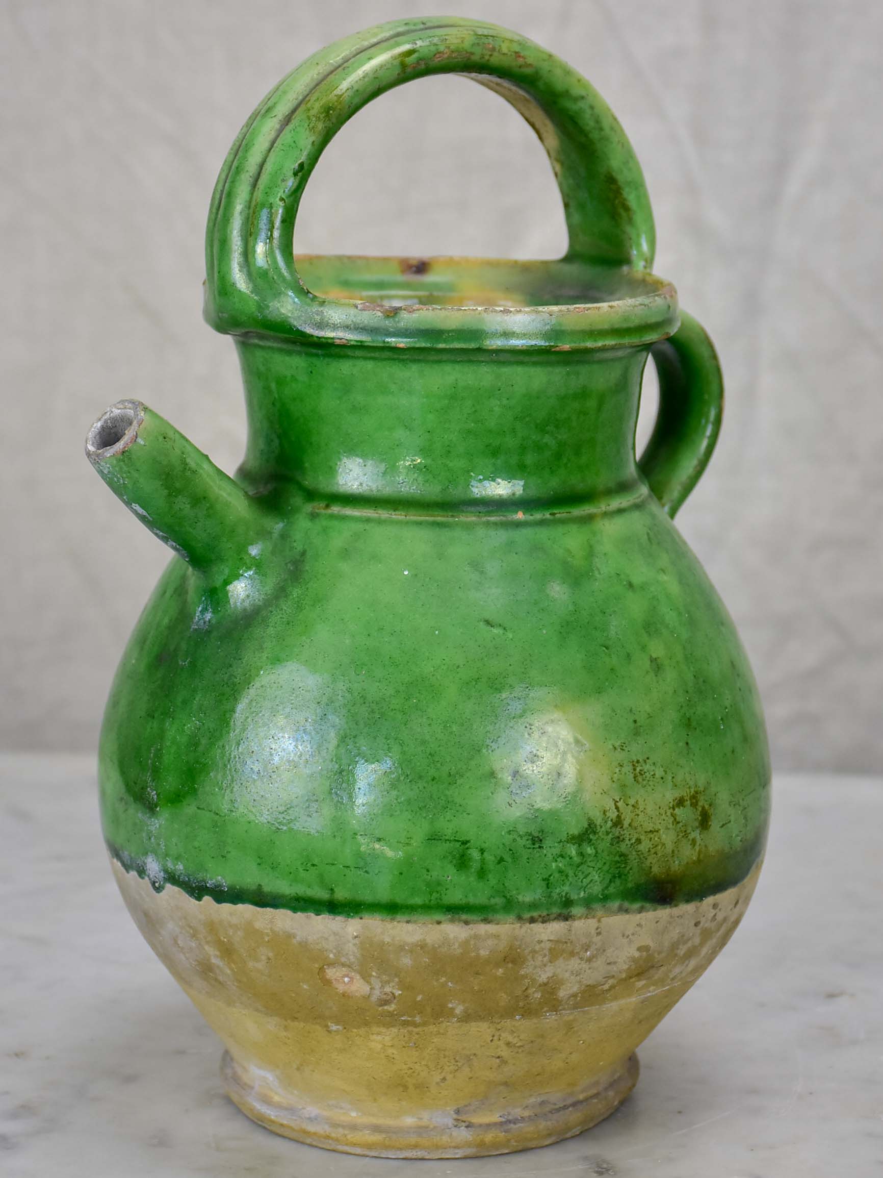 Small 19th Century French water pitcher with green glaze