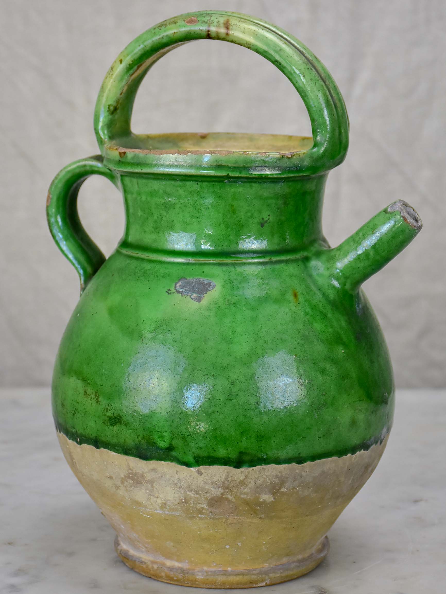 Small 19th Century French water pitcher with green glaze