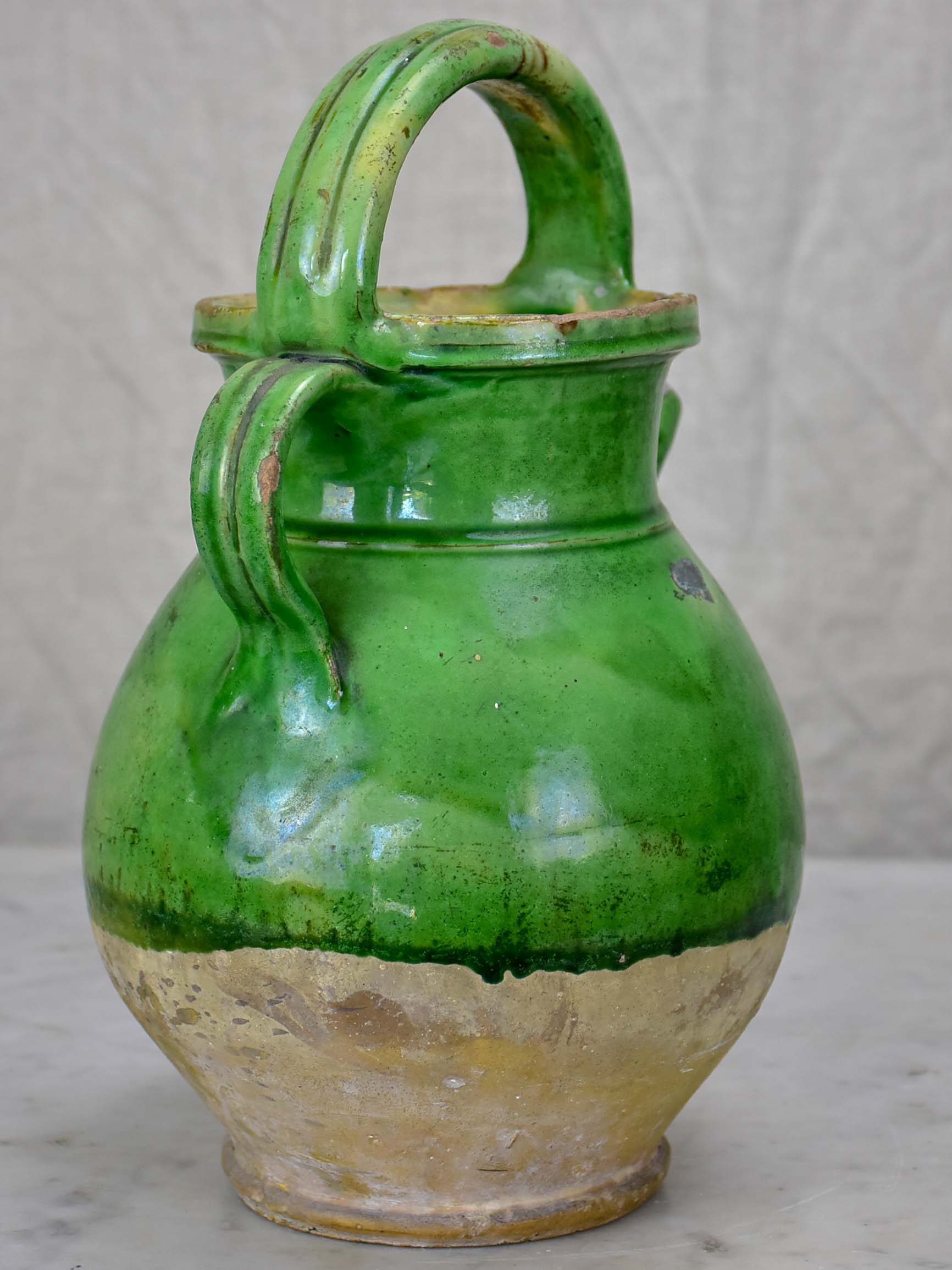 Small 19th Century French water pitcher with green glaze