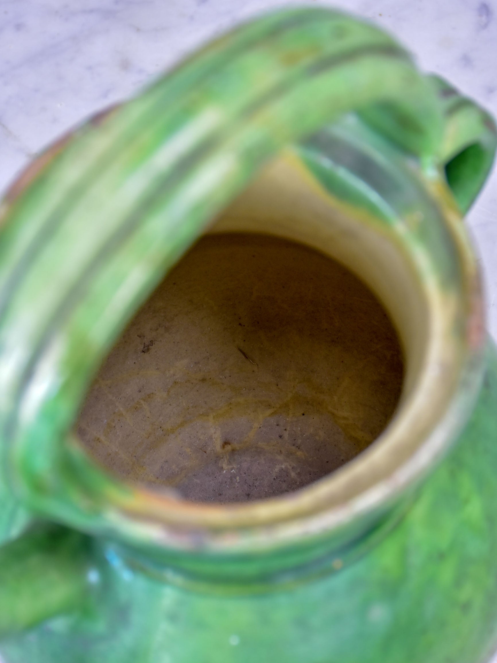 Small 19th Century French water pitcher with green glaze