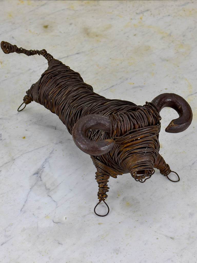 2001 wire sculpture of a bull signed Pommier