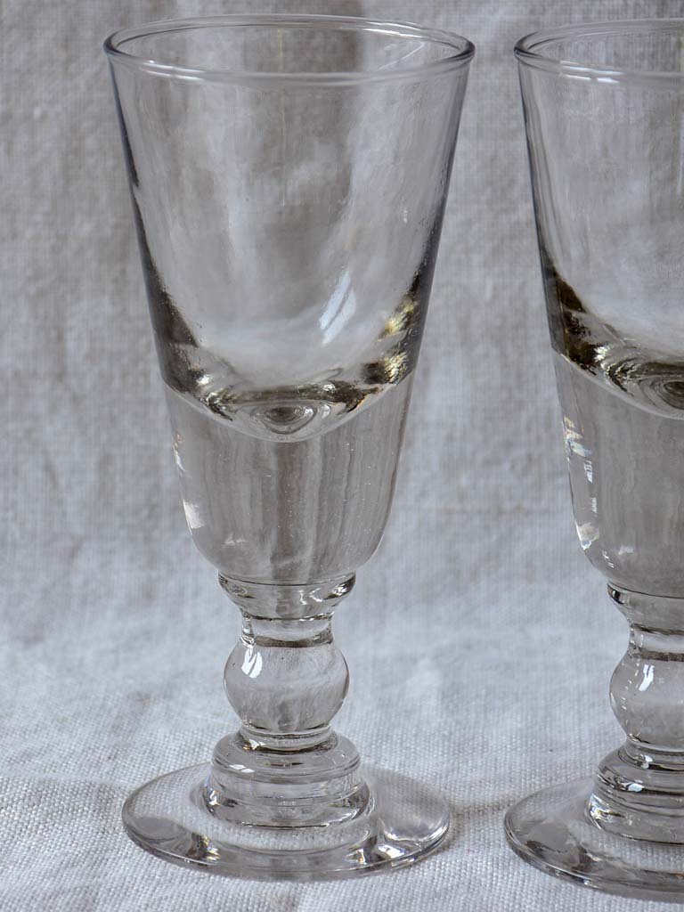 Four late 19th Century French absinthe glasses