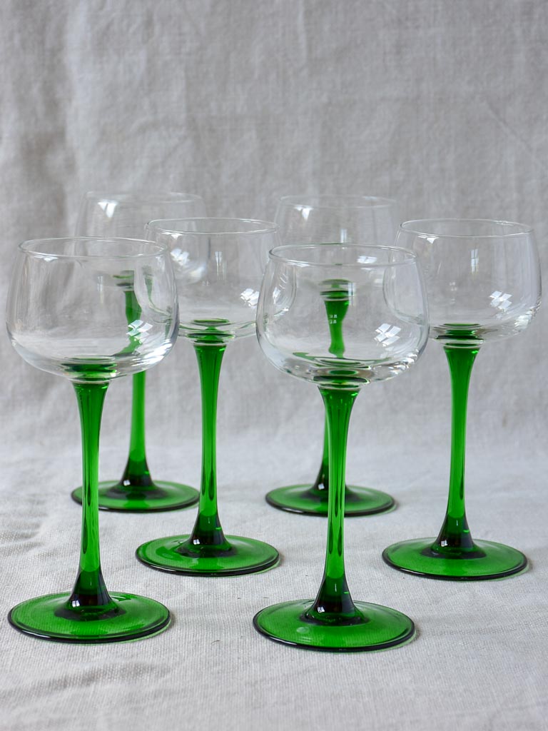 Six vintage Alsatian wine glasses with green stems