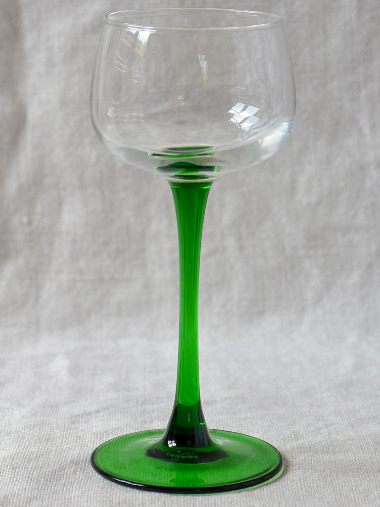 Six vintage Alsatian wine glasses with green stems