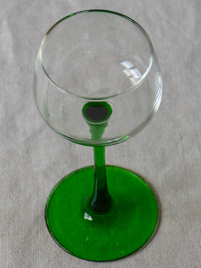 Six vintage Alsatian wine glasses with green stems