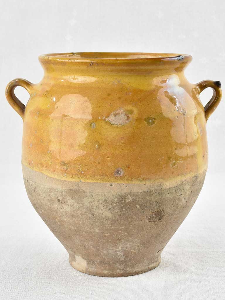 Antique French confit pot with ocher glaze and green splash - 8¼"