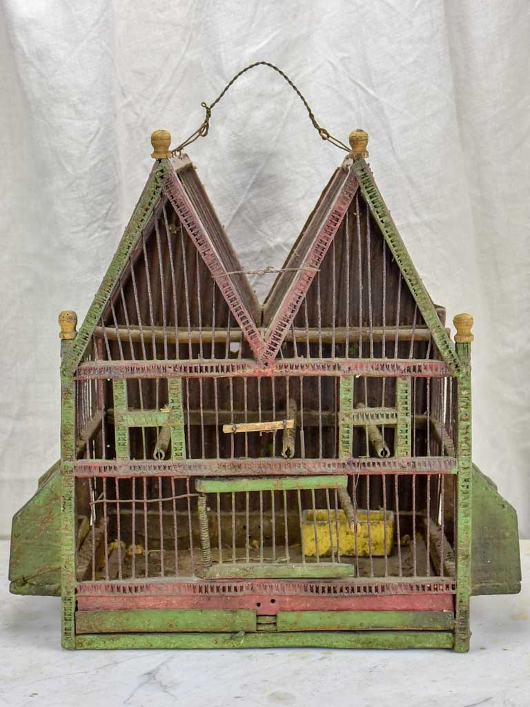 Antique French birdcage with double-pitched roof