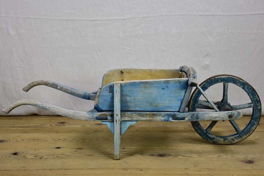 Early 20th Century French children's wheelbarrow with blue patina