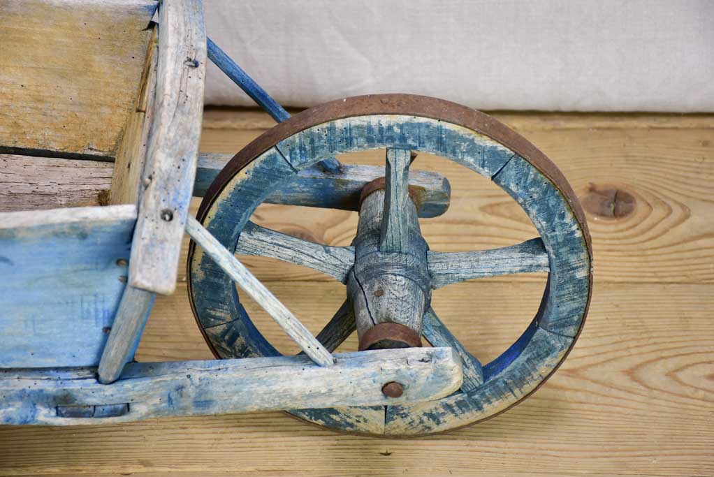 Early 20th Century French children's wheelbarrow with blue patina