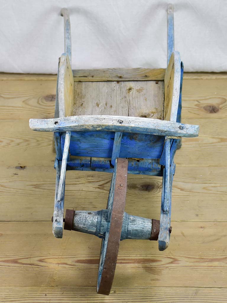 Early 20th Century French children's wheelbarrow with blue patina