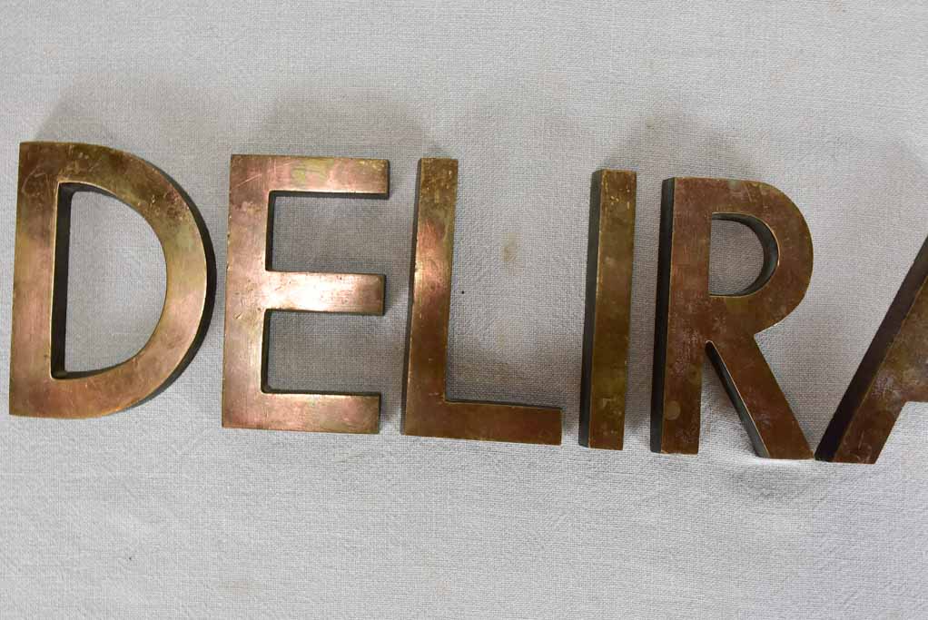 Collection of mid century Bronze letters DELIRANT 5½"