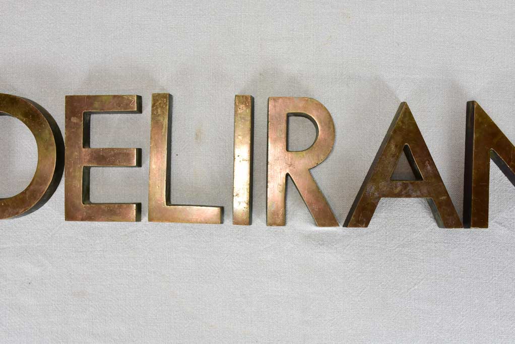 Collection of mid century Bronze letters DELIRANT 5½"