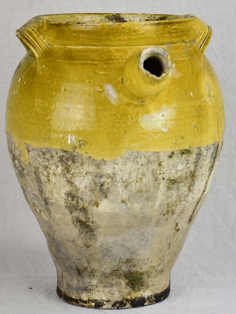 Early 19th Century French cooking clay pot with yellow glaze and handle