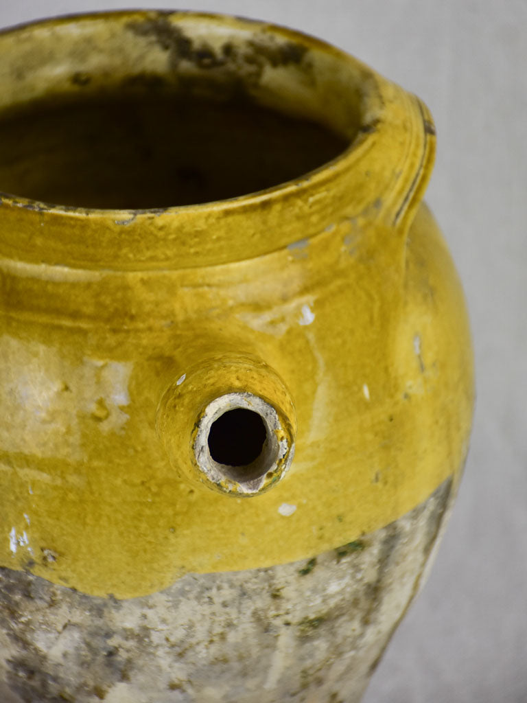 Early 19th Century French cooking clay pot with yellow glaze and handle