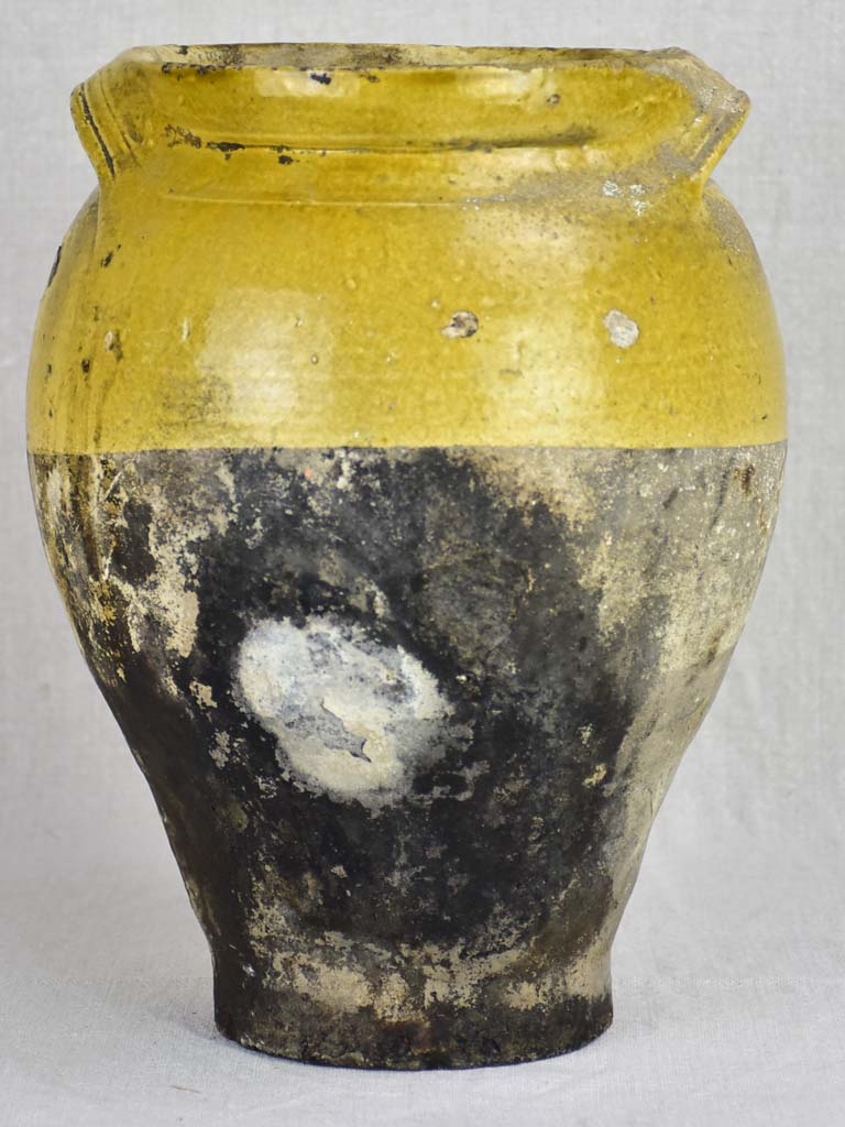 Early 19th Century French cooking clay pot with yellow glaze and handle